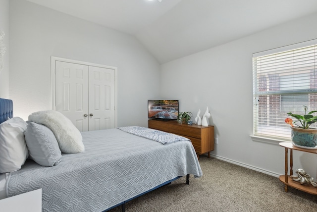 2820 Lone Ranger Trl, Little Elm, TX 75068 - carpeted bedroom featuring vaulted ceiling, a closet, and baseboards
