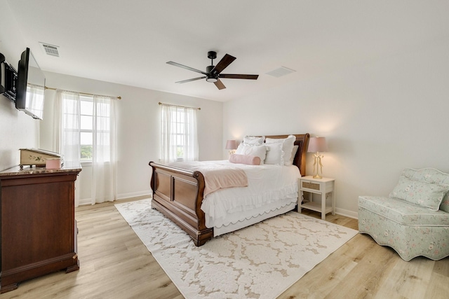 3823 Bluebonnet Trl, Princeton, TX 75407 - bedroom featuring light wood-type flooring, baseboards, and a ceiling fan