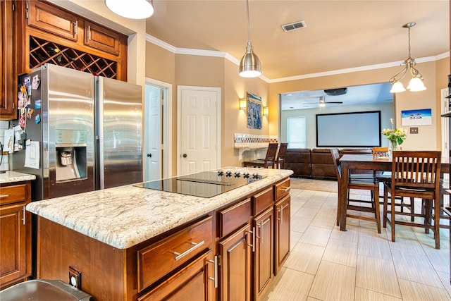 1727 Parkwood Dr, Grapevine, TX 76051 - kitchen with stainless steel fridge with ice dispenser, black electric stovetop, a ceiling fan, ornamental molding, and brown cabinetry