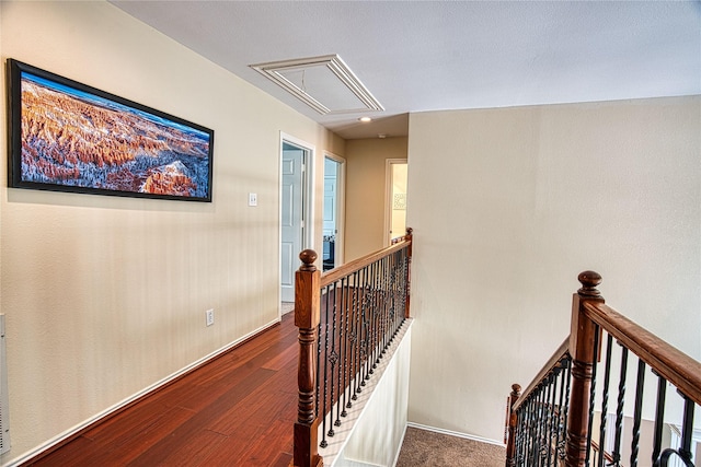 1727 Parkwood Dr, Grapevine, TX 76051 - hallway featuring an upstairs landing, attic access, and wood finished floors