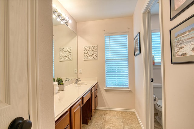 1727 Parkwood Dr, Grapevine, TX 76051 - bathroom featuring double vanity and tile patterned flooring