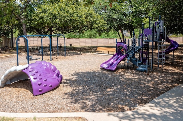 1727 Parkwood Dr, Grapevine, TX 76051 - community jungle gym with view of wooded area