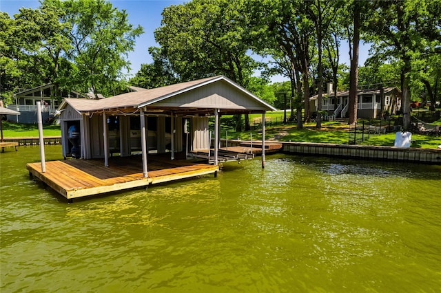 dock area featuring a water view and boat lift