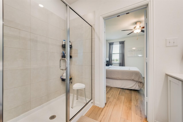 14620 Serrano Ridge Rd, Fort Worth, TX 76052 - ensuite bathroom featuring a shower stall, wood finished floors, and a ceiling fan