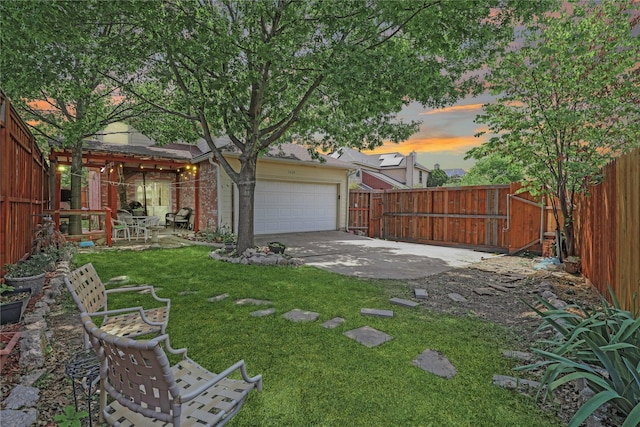 5428 Redwater Ct, The Colony, TX 75056 - view of yard featuring an attached garage and driveway