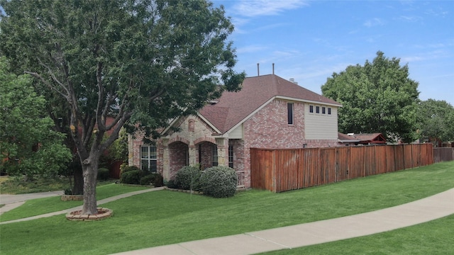 5428 Redwater Ct, The Colony, TX 75056 - view of front of property featuring brick siding, roof with shingles, and stone siding