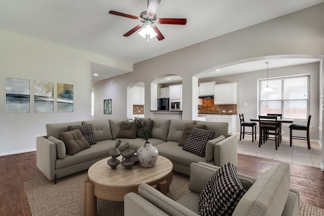 1370 Misty Cv, Rockwall, TX 75087 - living room with a ceiling fan, arched walkways, and recessed lighting