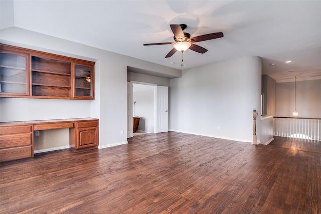 1370 Misty Cv, Rockwall, TX 75087 - unfurnished living room featuring built in study area, dark wood-type flooring, a ceiling fan, and recessed lighting