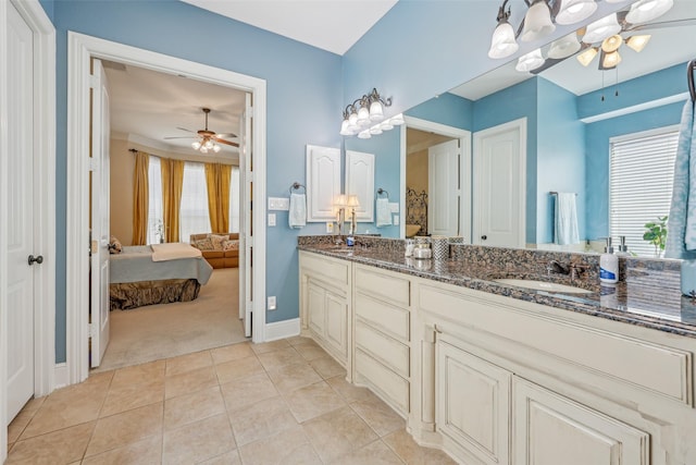 7905 Trixie Trail Dr, Mckinney, TX 75070 - ensuite bathroom featuring ceiling fan, tile patterned floors, double vanity, and baseboards