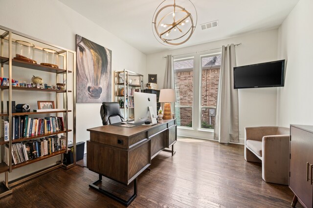 office featuring visible vents, an inviting chandelier, and dark wood finished floors