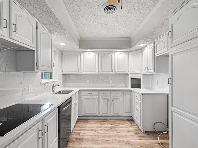 13514 Onyx Ln, Farmers Branch, TX 75234 - kitchen with visible vents, stainless steel dishwasher, a sink, black electric stovetop, and a textured ceiling