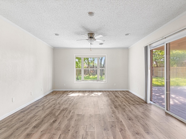 13514 Onyx Ln, Farmers Branch, TX 75234 - unfurnished room featuring a ceiling fan, a textured ceiling, light wood-style floors, and ornamental molding