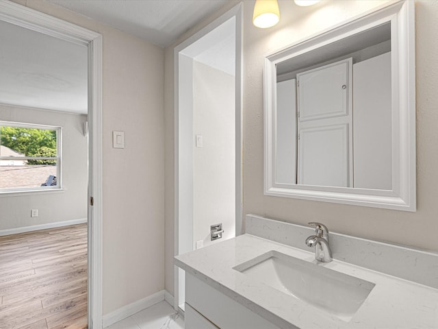13514 Onyx Ln, Farmers Branch, TX 75234 - bathroom with baseboards and vanity
