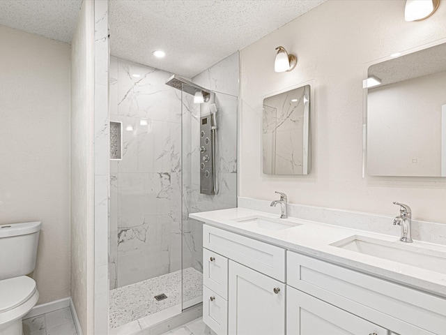 13514 Onyx Ln, Farmers Branch, TX 75234 - bathroom featuring marble finish floor, toilet, a sink, and a marble finish shower