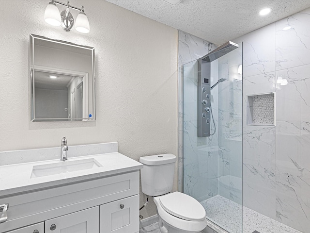 13514 Onyx Ln, Farmers Branch, TX 75234 - bathroom featuring a textured ceiling, a marble finish shower, vanity, toilet, and recessed lighting
