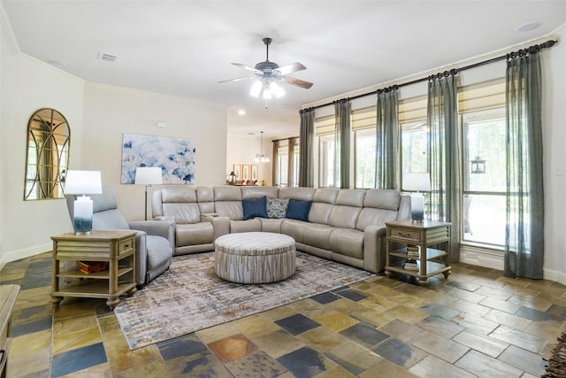 7200 Oak Creeks Ct, Fort Worth, TX 76135 - living room featuring ceiling fan, a stone fireplace, visible vents, crown molding, and arched walkways