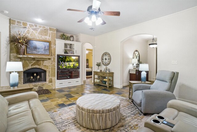 7200 Oak Creeks Ct, Fort Worth, TX 76135 - living area featuring ceiling fan, stone tile floors, baseboards, visible vents, and ornamental molding