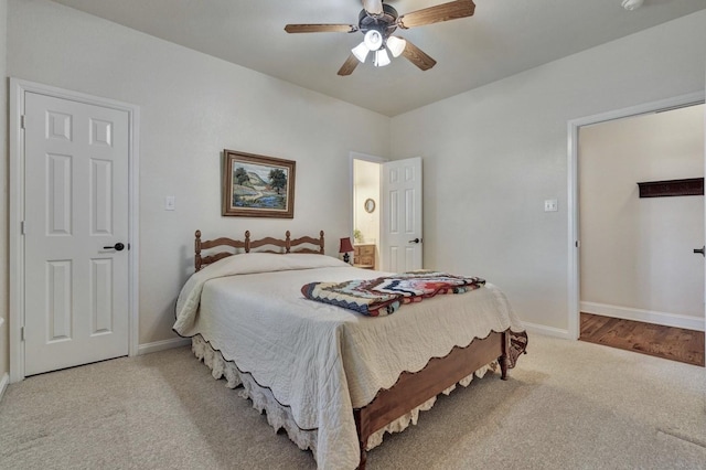 bedroom featuring carpet flooring, baseboards, and a ceiling fan