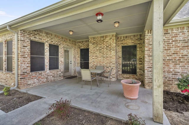 view of patio with outdoor dining area