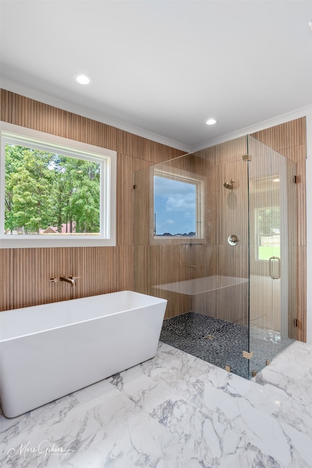 831 Walstonburg Ln, Benton, LA 71006 - bathroom featuring crown molding, a freestanding tub, a stall shower, wooden walls, and recessed lighting
