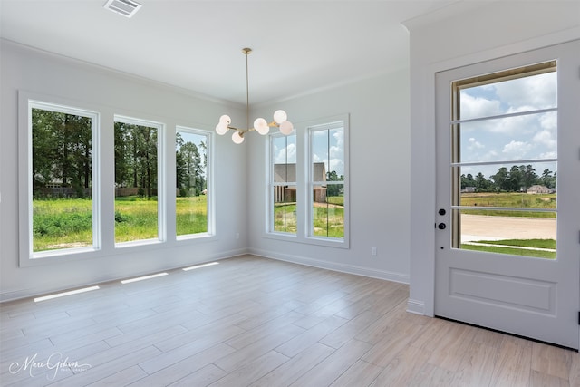 831 Walstonburg Ln, Benton, LA 71006 - unfurnished dining area with a chandelier and light wood-style flooring