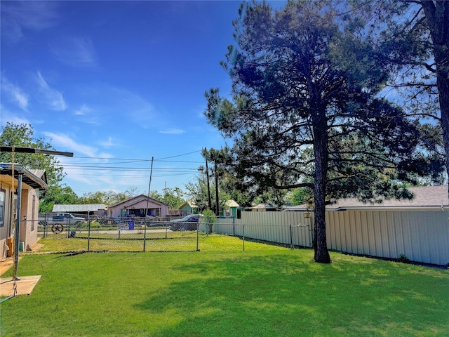 view of yard with fence