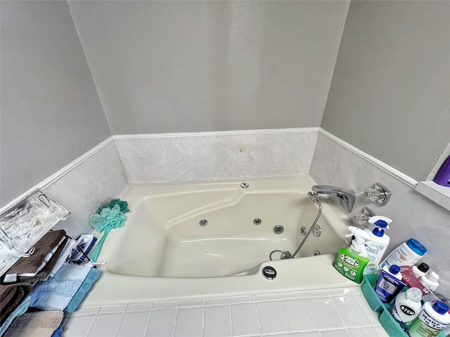 full bath with a whirlpool tub
