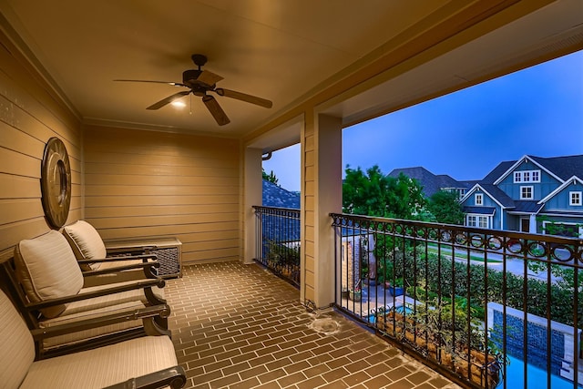 balcony featuring ceiling fan