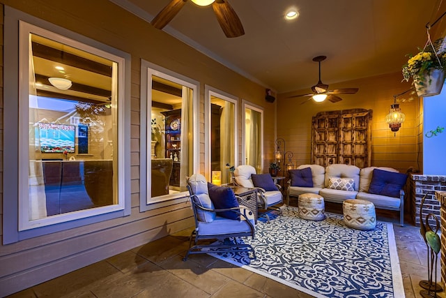 view of patio featuring an outdoor hangout area and a ceiling fan