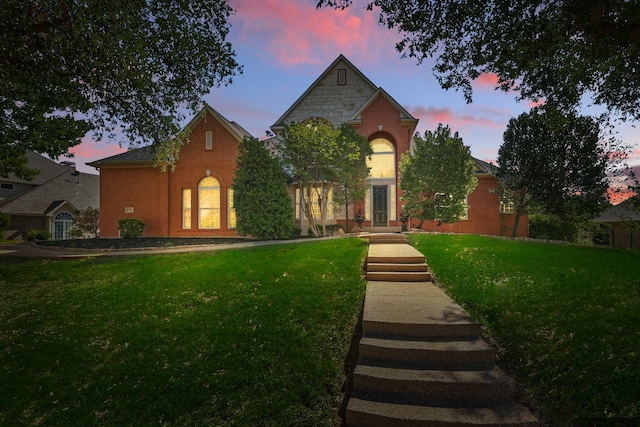 2704 Wisdom Creek Dr, Flower Mound, TX 75022 - view of front of property with brick siding and a yard