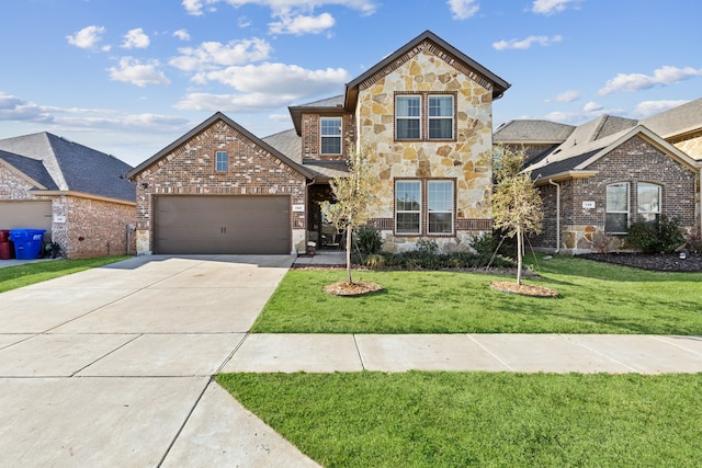 traditional home featuring driveway, stone siding, a garage, brick siding, and a front yard