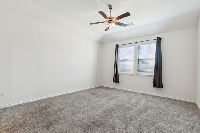 unfurnished room featuring visible vents, baseboards, a ceiling fan, and carpet flooring