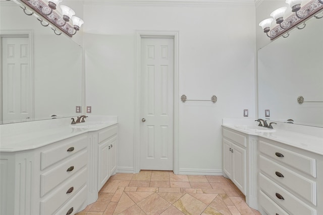 803 Eagle Pass, Heath, TX 75032 - full bath with two vanities, baseboards, and ornamental molding