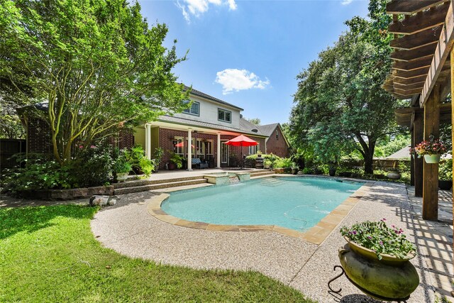 803 Eagle Pass, Heath, TX 75032 - view of swimming pool featuring a patio area and a pool with connected hot tub