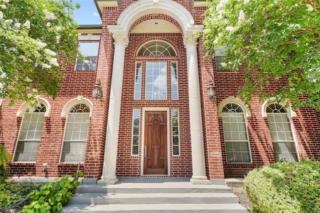 803 Eagle Pass, Heath, TX 75032 - doorway to property featuring brick siding