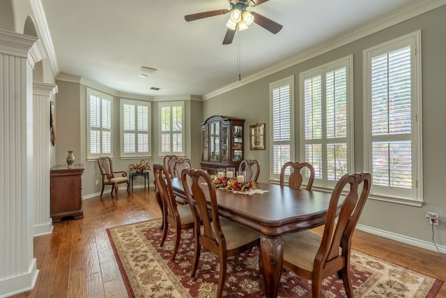 1609 Willow Ln, Mckinney, TX 75072 - dining room featuring wood finished floors, plenty of natural light, crown molding, and baseboards