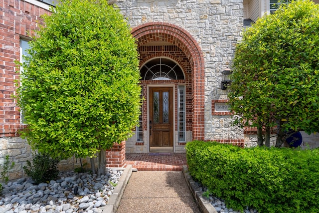1609 Willow Ln, Mckinney, TX 75072 - property entrance with brick siding and stone siding