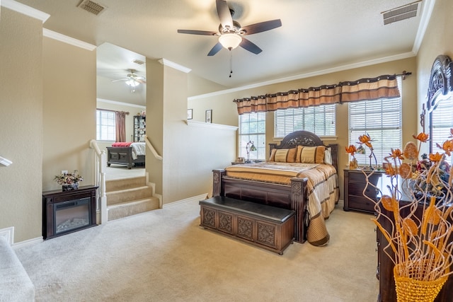1609 Willow Ln, Mckinney, TX 75072 - bedroom featuring visible vents, ornamental molding, ceiling fan, and carpet floors