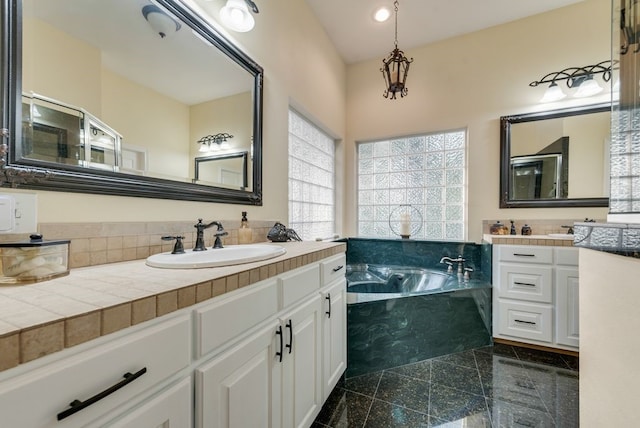 full bathroom featuring a bath, granite finish floor, vanity, a shower, and recessed lighting