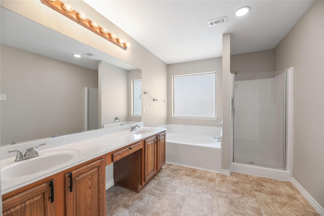 full bath featuring a garden tub, a sink, visible vents, and a stall shower