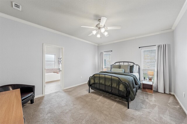 carpeted bedroom featuring visible vents, crown molding, baseboards, and multiple windows