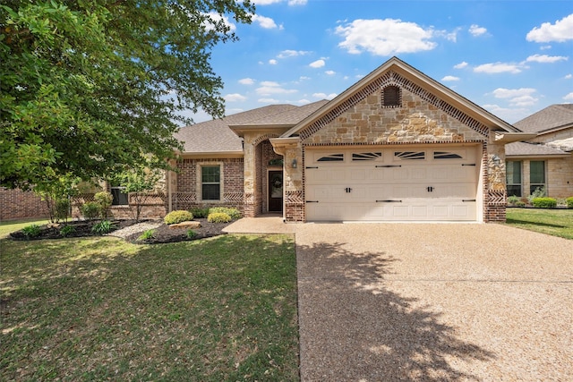 view of front facade with concrete driveway, brick siding, a front yard, and a garage