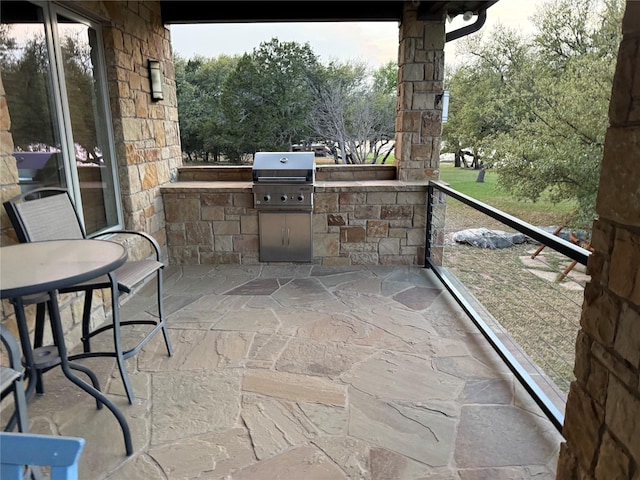 view of patio / terrace with grilling area and exterior kitchen