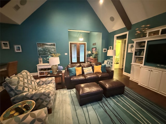 living room featuring french doors, visible vents, baseboards, wood finished floors, and high vaulted ceiling