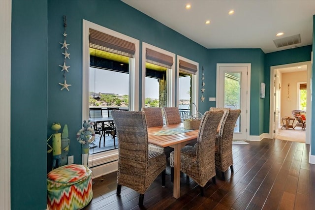 dining space with baseboards, visible vents, recessed lighting, and dark wood-style flooring