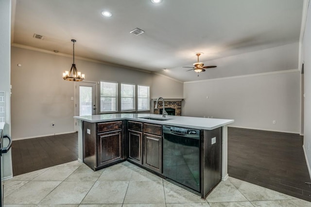 kitchen featuring a sink, visible vents, black dishwasher, ceiling fan with notable chandelier, and ornamental molding