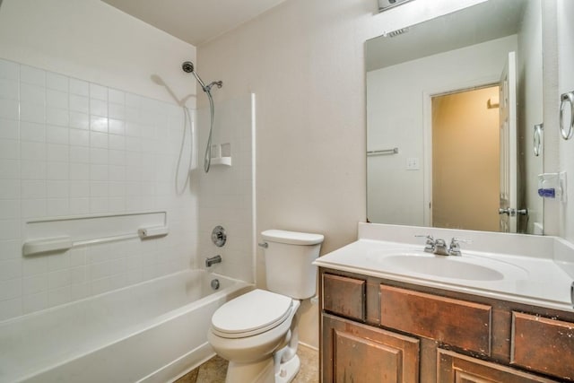 bathroom featuring shower / bathtub combination, toilet, and vanity