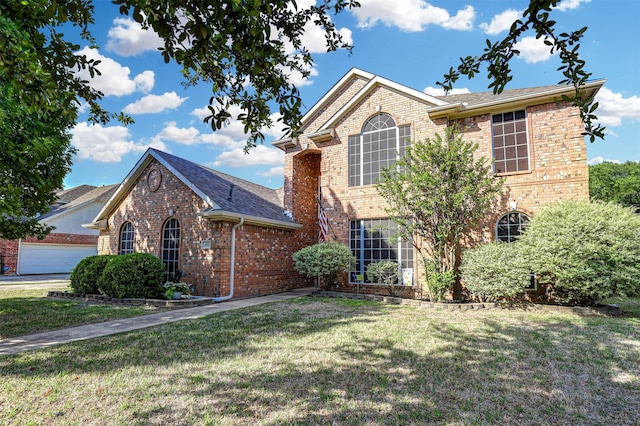816 Flagstone Dr, Burleson, TX 76028 - traditional-style house featuring brick siding, a front yard, and an attached garage