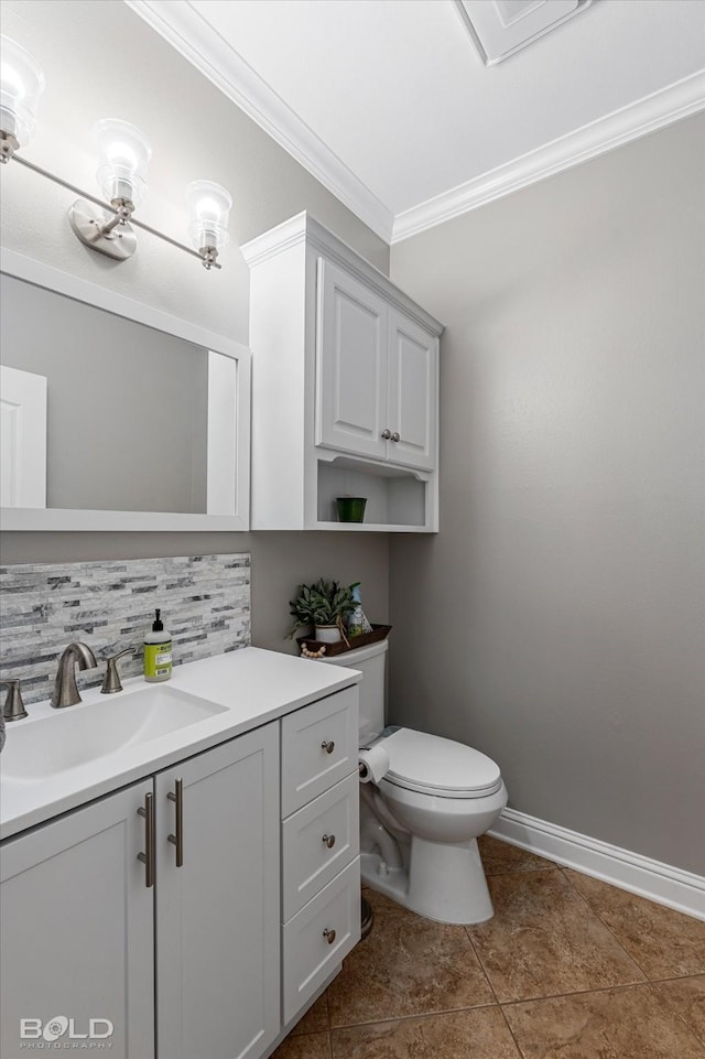 half bathroom with crown molding, vanity, backsplash, toilet, and tile patterned flooring