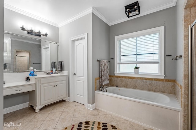 full bathroom featuring a garden tub, vanity, tile patterned flooring, and a shower stall